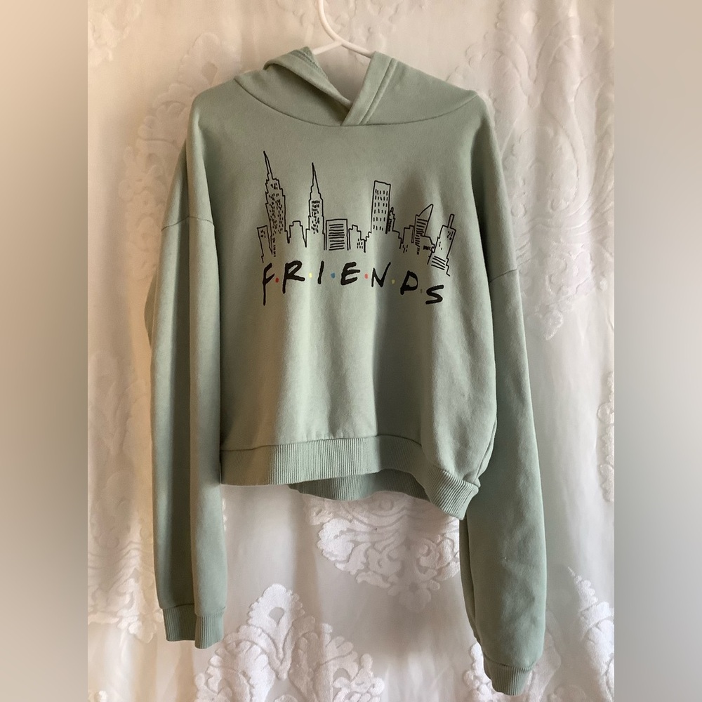 H&M Green Hoodie with Cityscape Graphic